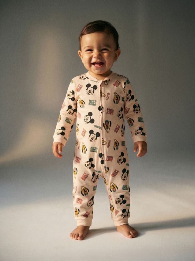 Sinsay - Salopetă din bumbac pentru bebeluși Mickey Mouse - bej