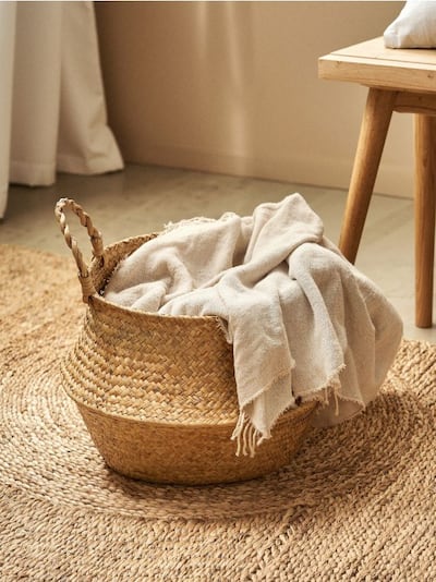 Geflochtener Aufbewahrungskorb mit Griffen