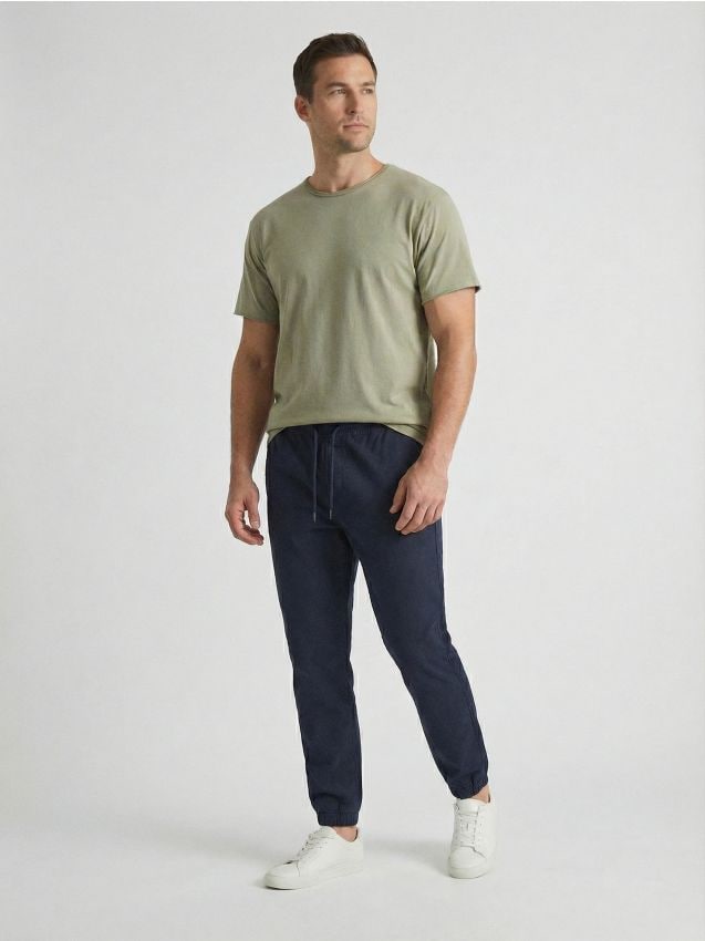 Sinsay - Bawełniane spodnie jogger - granatowy