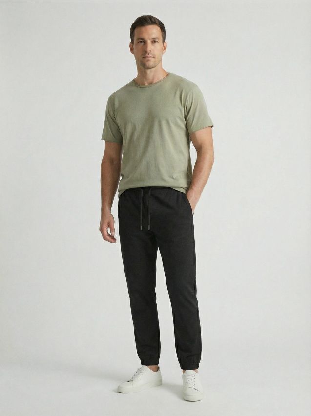Sinsay - Pantaloni din bumbac jogger - negru