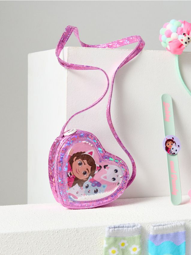 Sinsay - Geantă în formă de inimă cu efect holografic Gabbys Dollhouse - roz-pastel