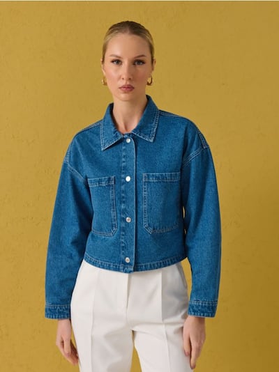 Коротка джинсова куртка