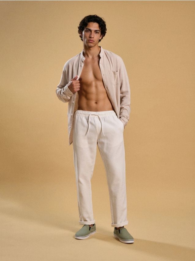 Sinsay - Spodnie chino jogger - kremowy