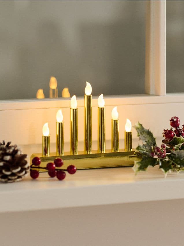 Sinsay - Dekoratívna LED lampa v tvare svietnika - zlatá