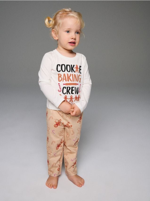 Sinsay - Dvojdielne vianočné pyžamo s motívom perníčkov - krémová