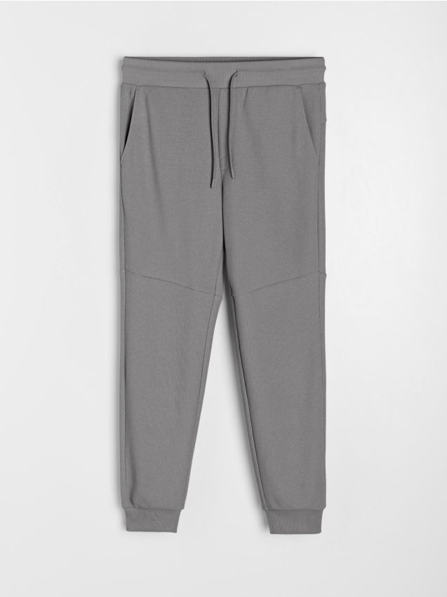 Sinsay - Pantaloni jogger de trening din material piqué - gri-neutru