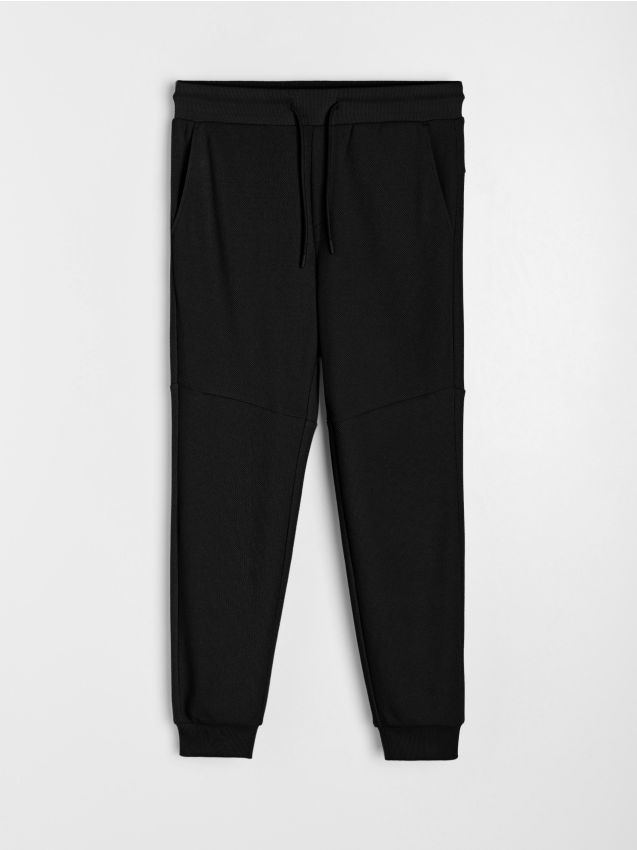Sinsay - Pantaloni jogger de trening din material piqué - negru