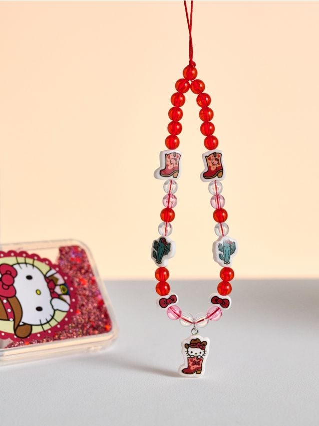 Sinsay - Pandantiv pentru telefon cu motiv cowboy Hello Kitty - roșu