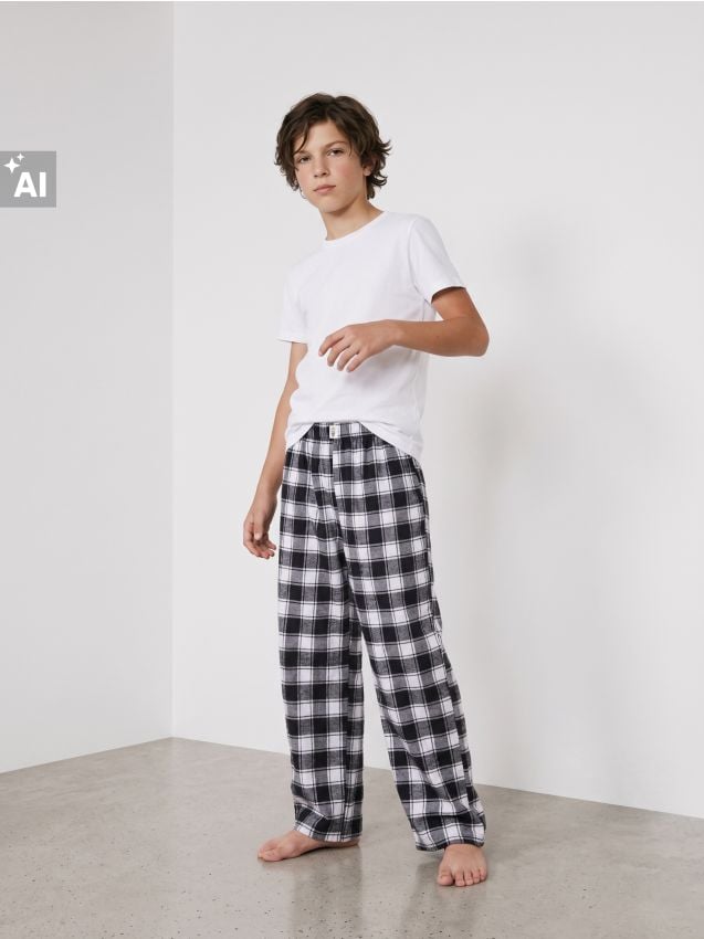 Sinsay - Pantaloni de pijama în carouri cu bumbac - negru