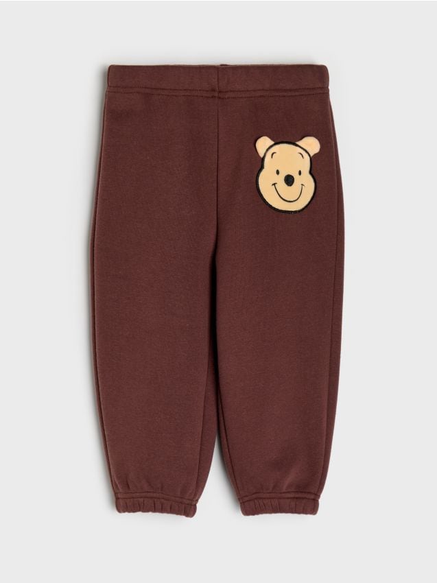 Sinsay - Pantaloni de trening călduroși din bumbac jogger Winnie the Pooh - maro-închis