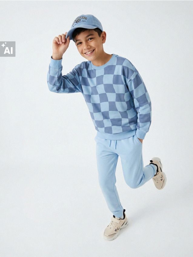 Sinsay - Bluză tip crewneck cu model în carouri - light blue