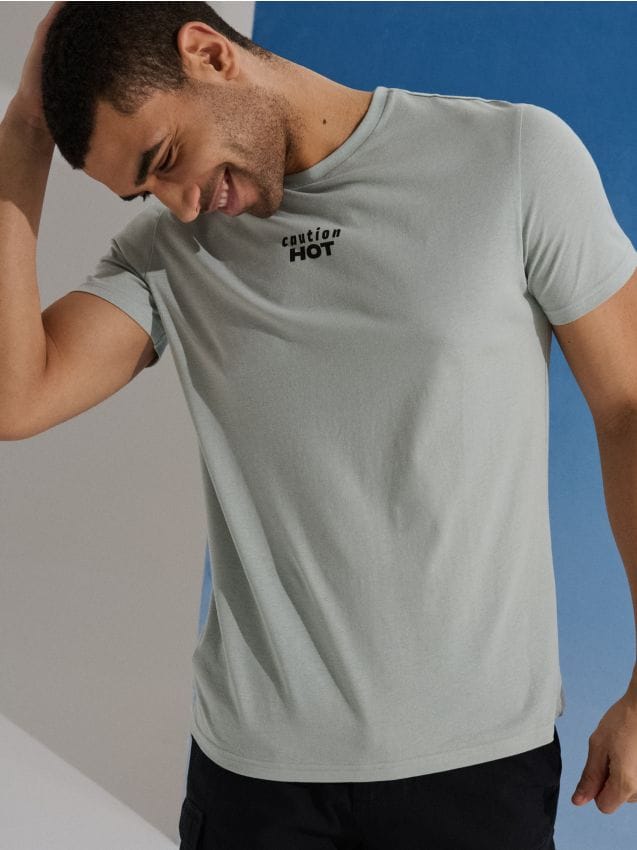 Sinsay - Tricou din bumbac cu inscripție Caution Hot - verde-mentă