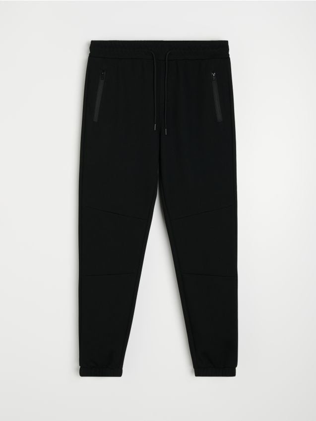 Sinsay - Spodnie dresowe slim fit z domieszką wiskozy - czarny