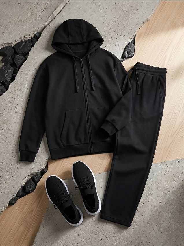 Sinsay - Pantaloni sport cu croială largă și bumbac - negru