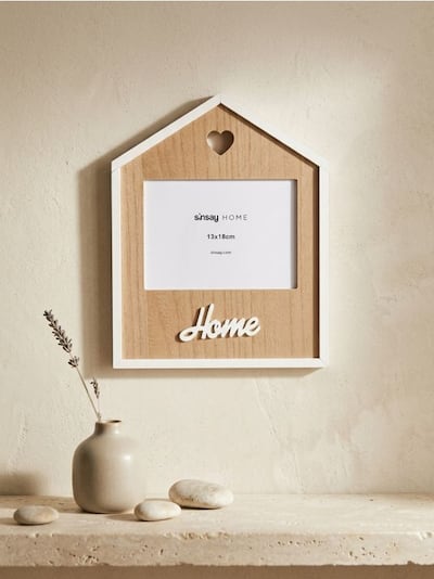 Dekorativer Bilderrahmen in Hausform