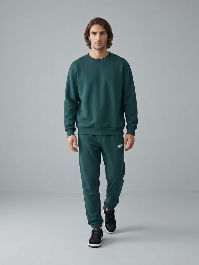 Sinsay - Pantaloni jogger slim fit - verde