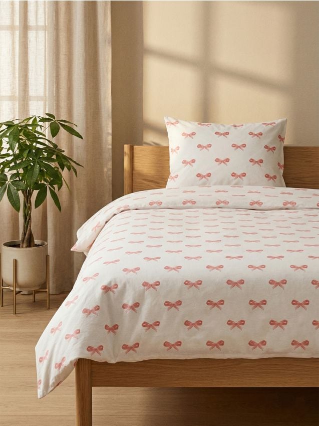 Sinsay - Set de lenjerie de pat cu bumbac cu motiv de funde - roz
