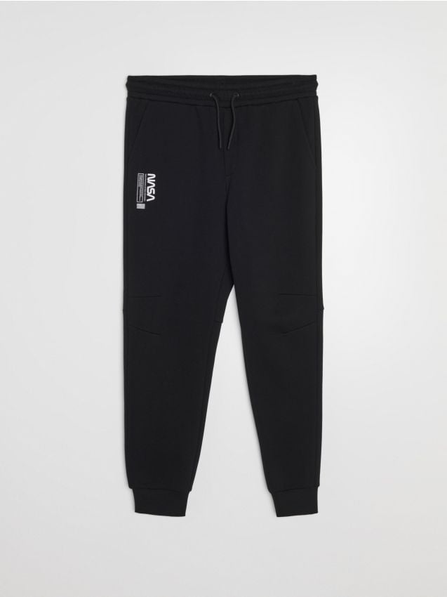 Sinsay - Pantaloni de trening tapered fit NASA - negru