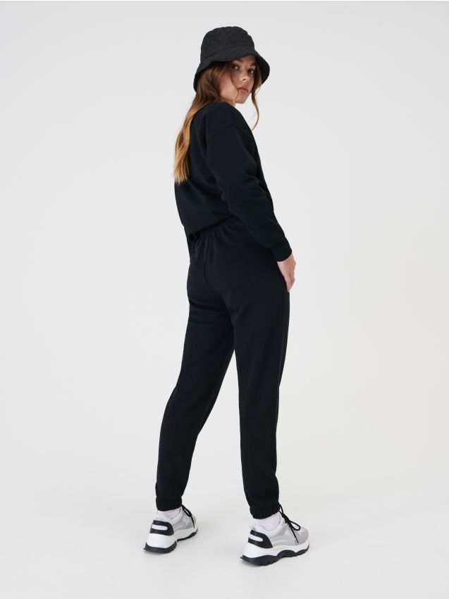 Sinsay - Pantaloni de trening cu manșete - negru