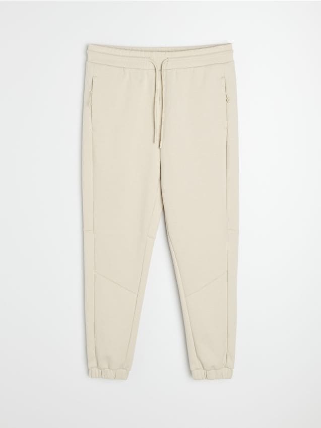 Sinsay - Pantaloni tapered fit Active - nude