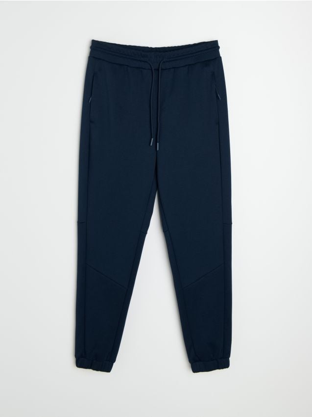 Sinsay - Pantaloni tapered fit Active - bleumarin