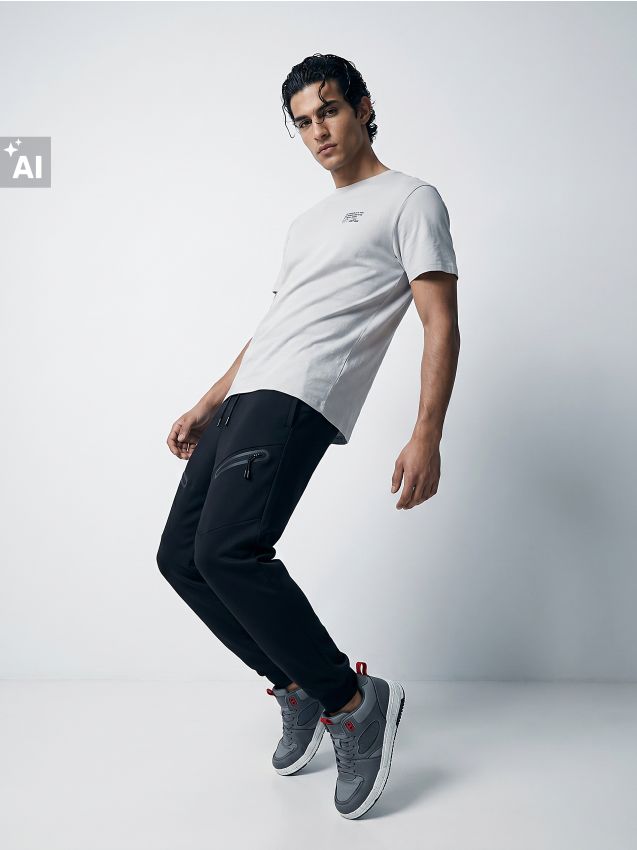Sinsay - Pantaloni jogger cu buzunare cu fermoar și cusături decorative - negru