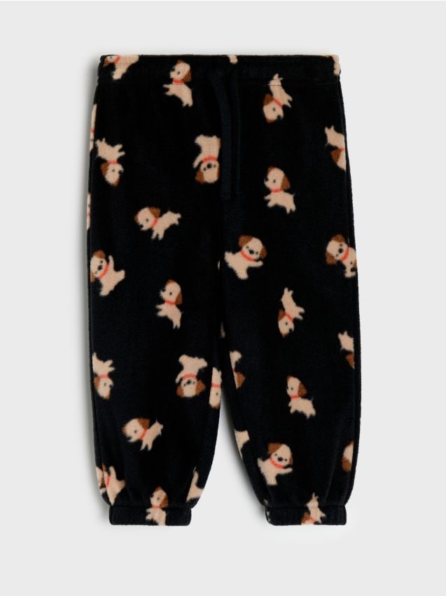 Sinsay - Pantaloni din fleece cu motiv de câini - negru