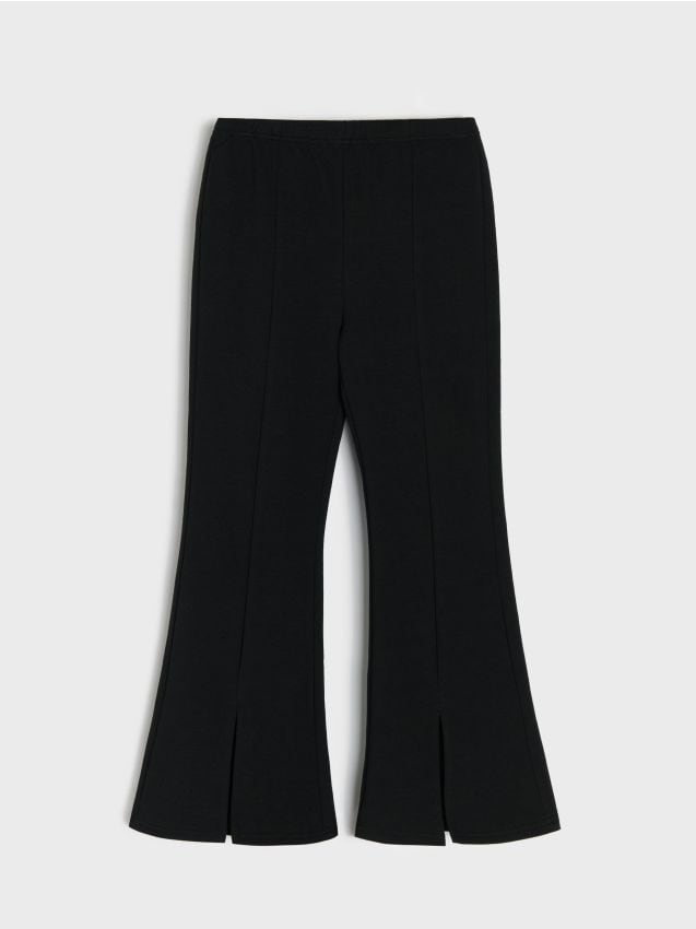 Sinsay - Spodnie flare z ozdobnymi rozcięciami - czarny