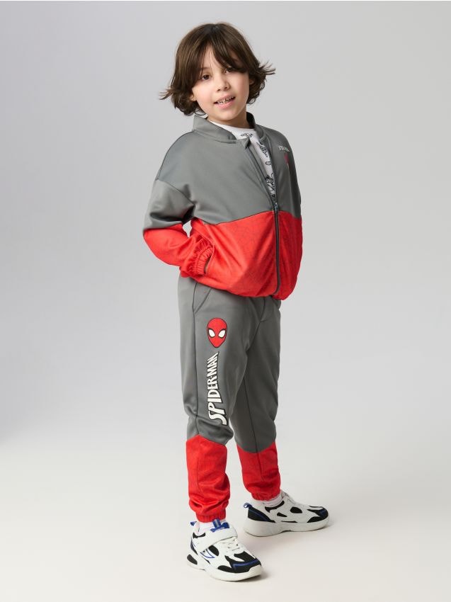 Sinsay - Spodnie dresowe jogger z nadrukiem Spiderman - szary