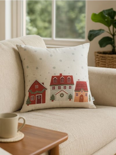 Різдвяна декоративна подушка з мотивом будинків