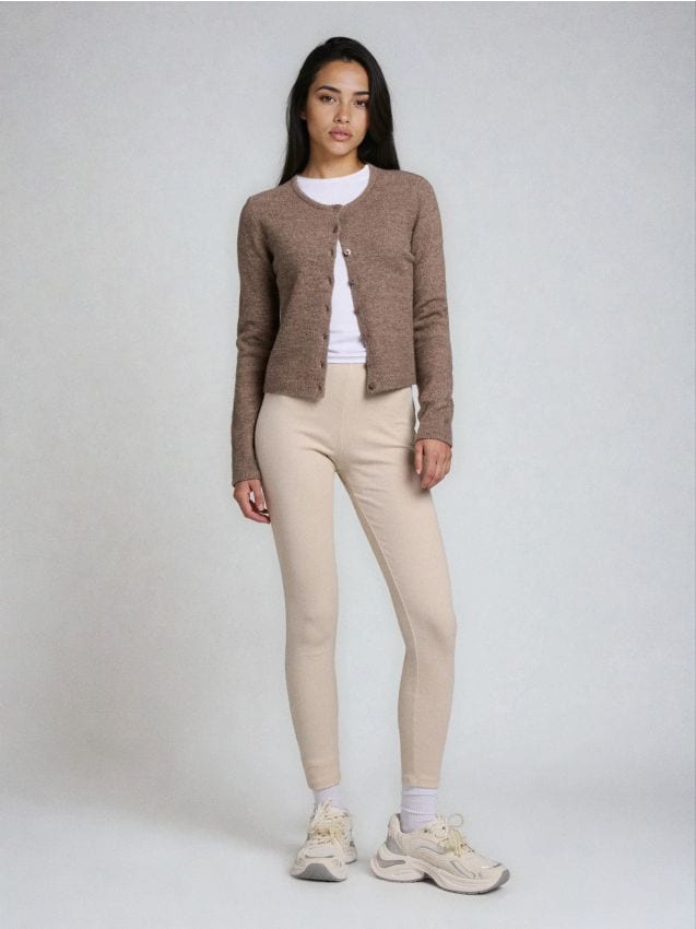 Sinsay - Prążkowane legginsy z gumką w pasie - kremowy