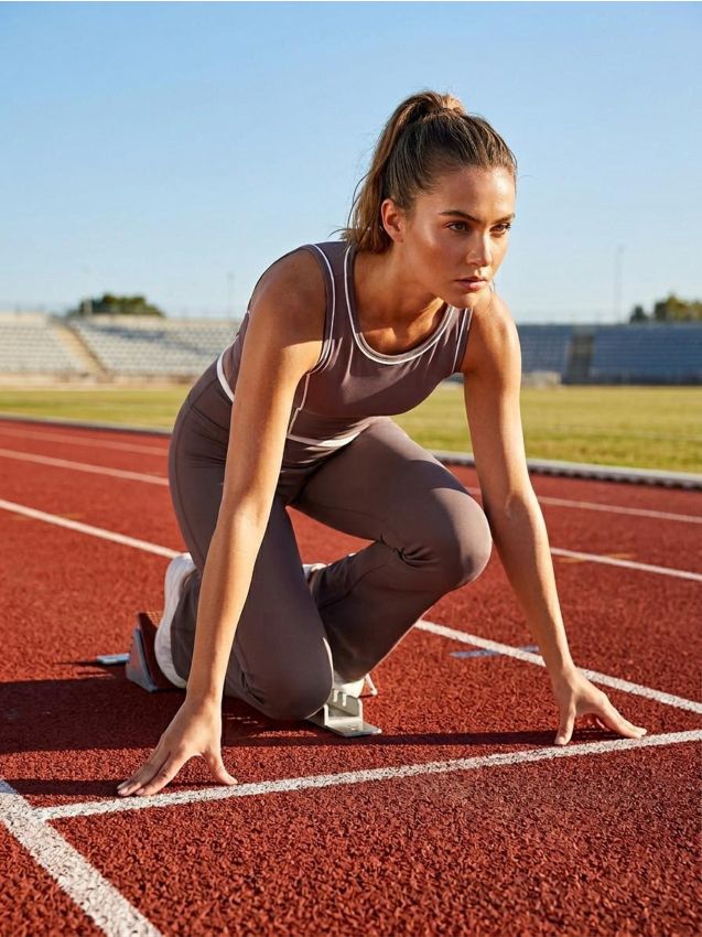 Sinsay - Leggings flare cu tiv contrastant Gym Hard - maro-închis