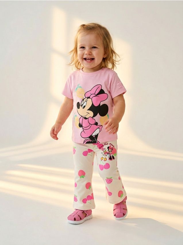 Sinsay - Bawełniane spodnie flare z nadrukiem Minnie Mouse - kremowy