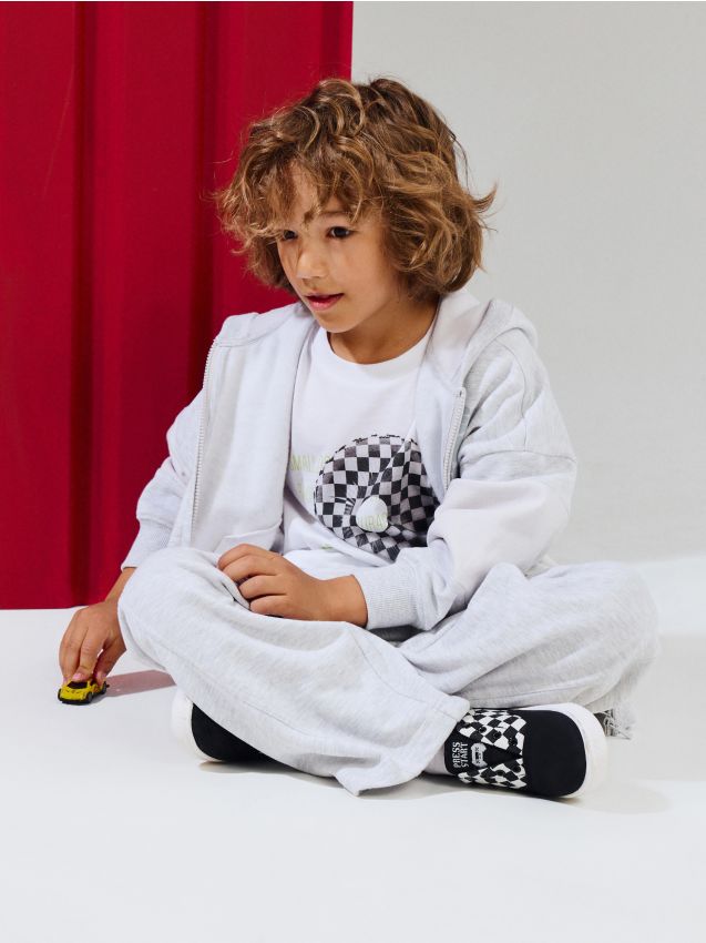 Sinsay - Tenși slip-on cu model în carouri - negru