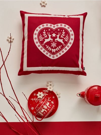 Świąteczna poszewka dekoracyjna z motywem z reniferów