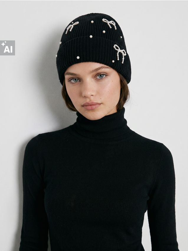 Sinsay - Căciulă beanie striată cu aplicație decorativă cu funde - negru