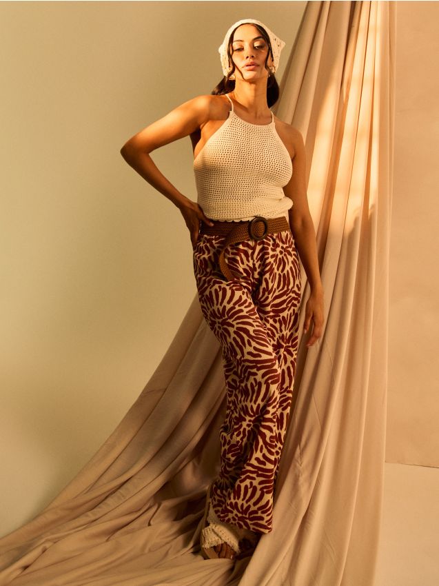Sinsay - Spodnie wide leg z abstrakcyjnym wzorem - wielobarwny