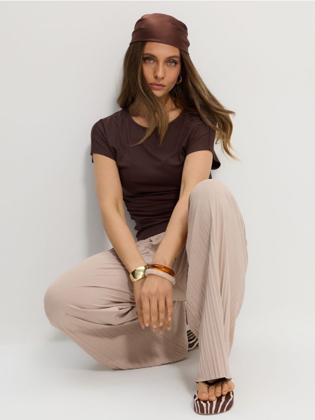 Pantaloni a palazzo plissettati con vita elastica - nude
