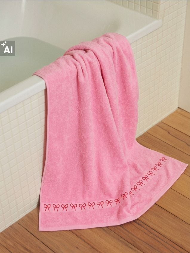 Sinsay - Pamučni ručnik za kupanje s jacquard obrubom s mašnicama