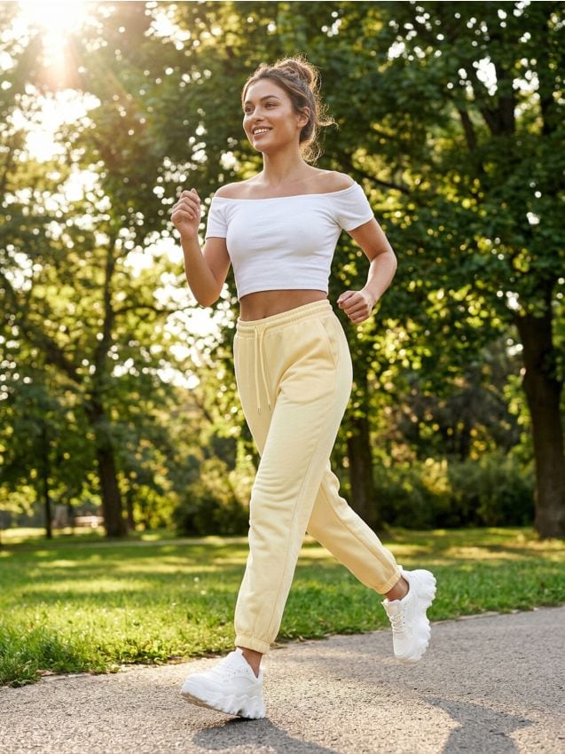 Sinsay - Pantaloni jogger din tricot terry - galben