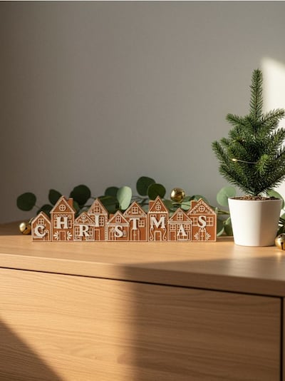 Weihnachtsdekoration in Form eines Häuschens