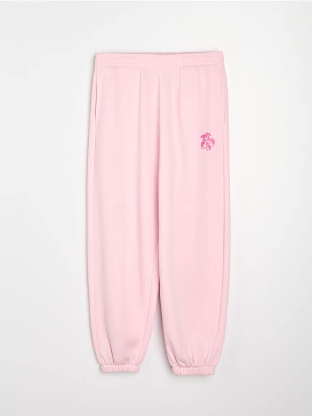 Sinsay - Spodnie jogger z kwiatowym nadrukiem - różowy