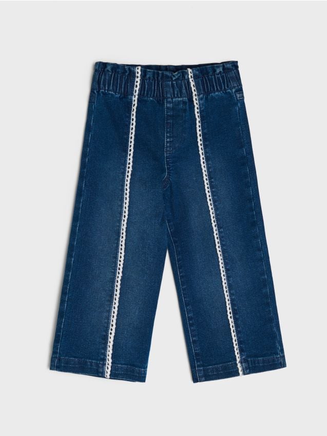 Sinsay - Pantaloni din denim de bumbac cu benzi laterale din dantelă - albastru