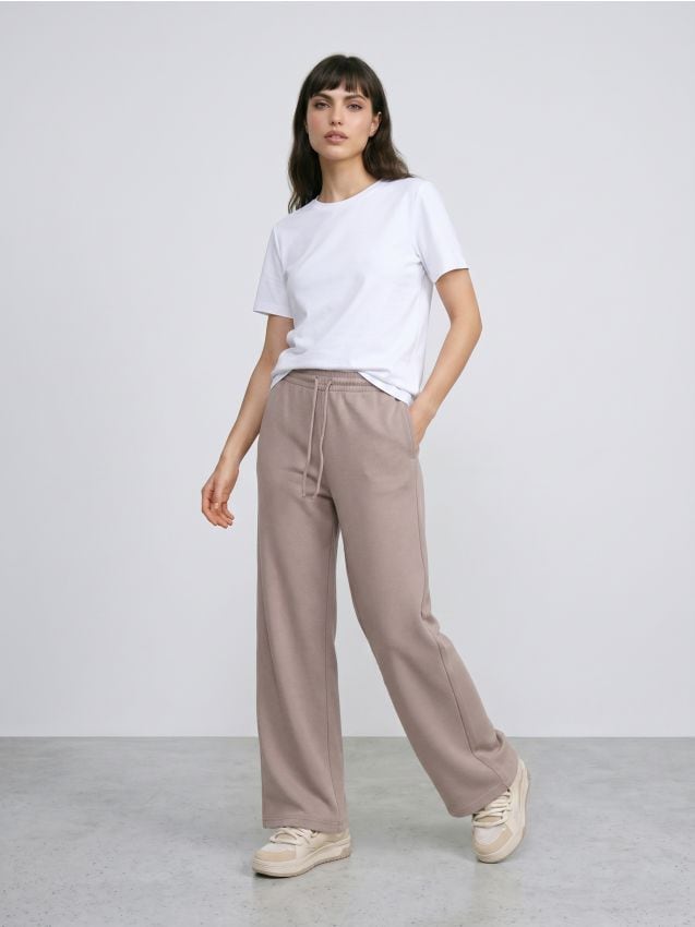 Sinsay - Pantaloni wide leg din tricot gros cu textură în dungi și căptușeală din fleece - galben-pal