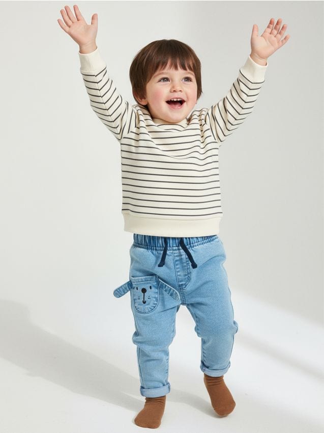 Sinsay - Jeansy jogger z aplikacją pieska 3D - niebieski