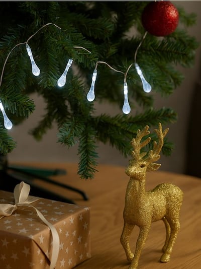 Kalėdų žiburiai ledkalnio formos