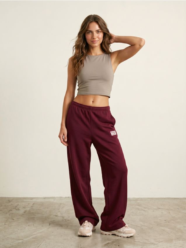 Sinsay - Pantaloni de trening wide leg cu aplicație - bordo