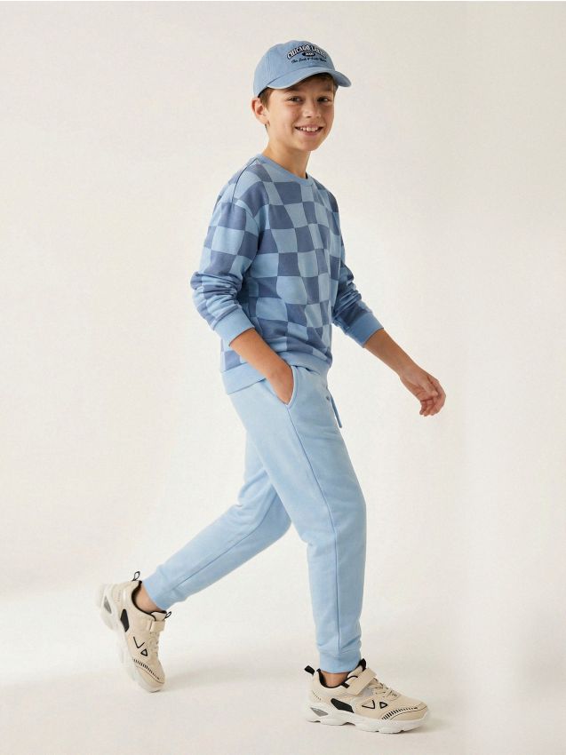 Sinsay - Spodnie dresowe loose - błękitny