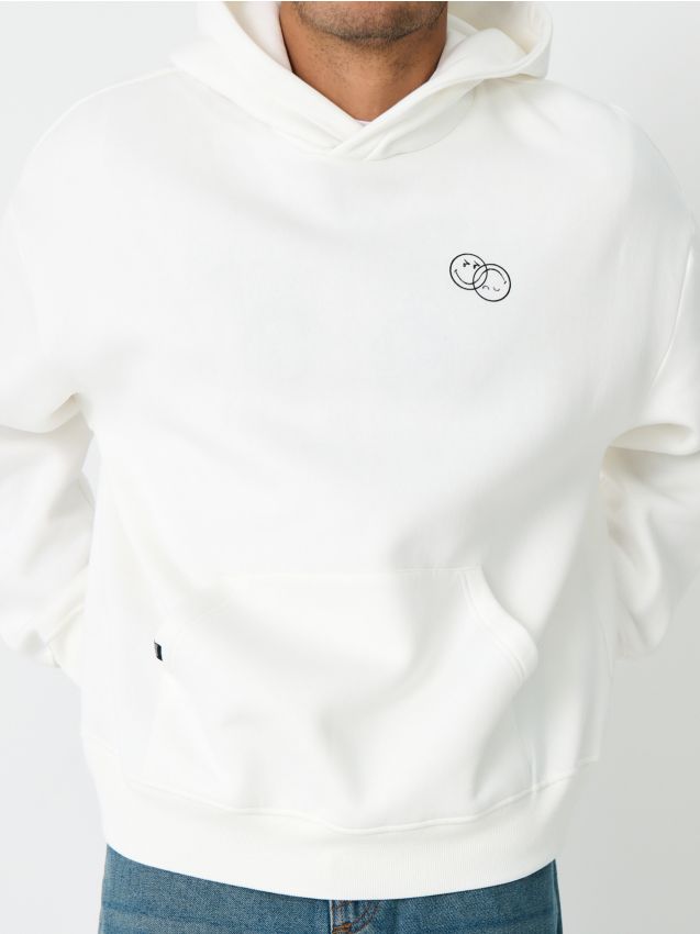 Sinsay - Bluza hoodie z nadrukiem na plecach SmileyWorld® - kremowy