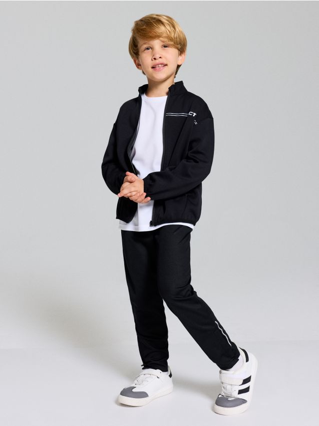 Sinsay - Pantaloni sport slim fit cu elemente reflectorizante Active - bleumarin